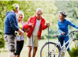 A heartwarming scene of a diverse group of older adults participating in different physical activities together, showcasing the importance of harmony in maintaining endurance and well-being.
